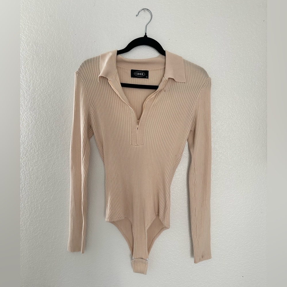 cute tan body suit